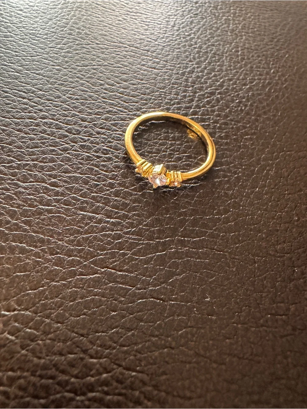 Delicate Gold tone Ring with Sparkling Center Stone “No, it’s not real gold.”